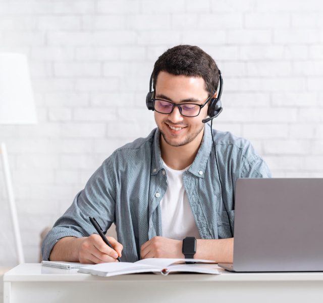 education-remotely-and-independently-smiling-guy-2022-12-16-08-10-10-utc.jpg